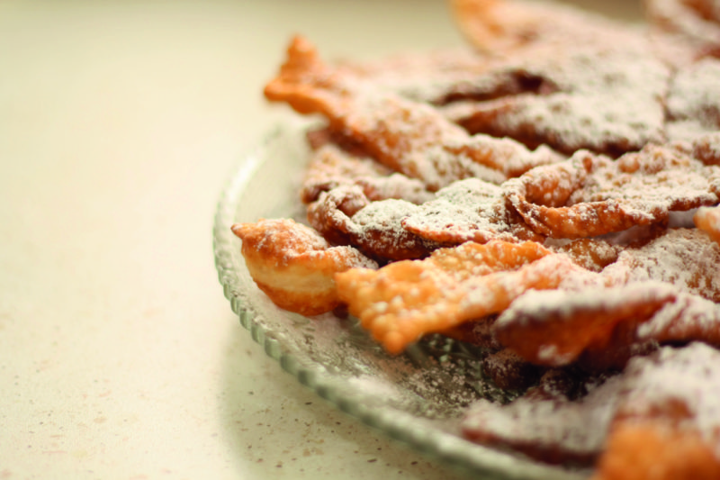 Bugnes, light fritters, are commonly eaten during Mardi Gras.