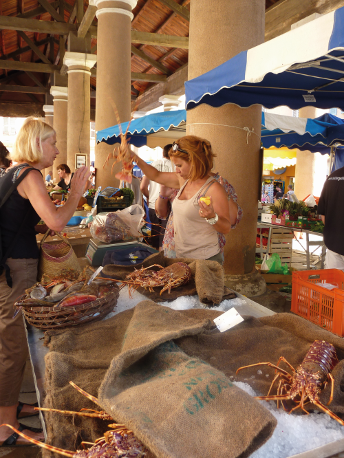 Everything from lobster to honey is sold at L’Île-Rousse's market.