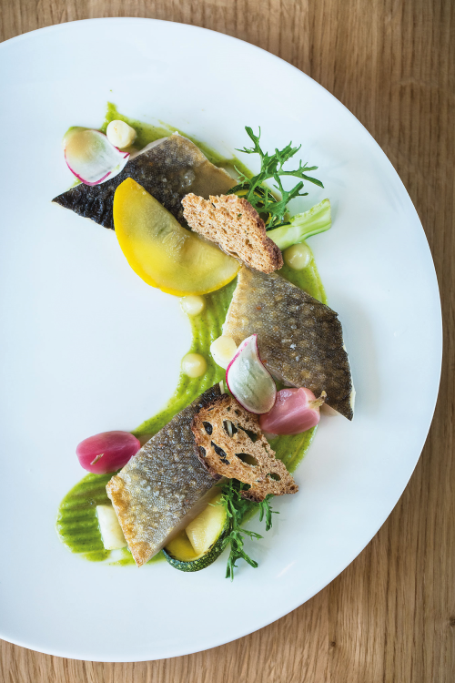 fish dish beautifully presented at le relais bernard loiseau