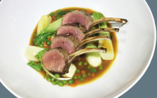 Lamb cutlets with peas, bacon and carrots
