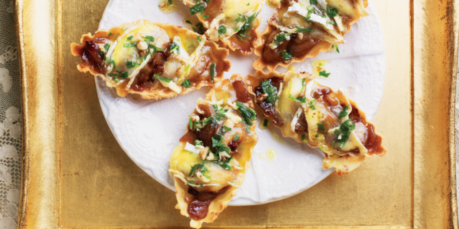 Camembert and apple tarts with a walnut drizzle