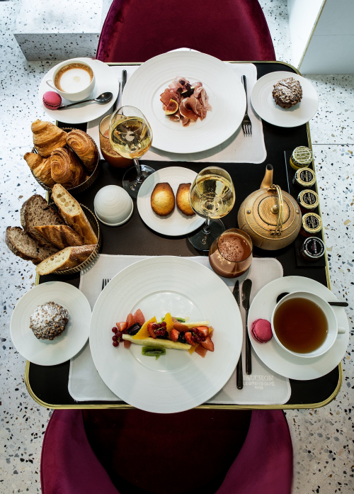 Breakfast cart at Fauchon L’Hôtel Paris with breads and fruits