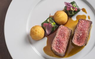 Entrecôte steak, Swiss chard bonbons and truffled dauphinoise potatoes