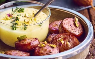 Montbéliard sausage with parsnips and pistachios