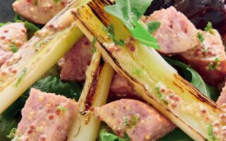 Grilled leeks, morteau sausage and Burgundy mustard-infused vinaigrette