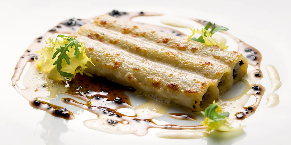 Stuffed macaroni with black truffle, artichoke and duck foie gras, gratinated with mature Parmesan cheese.