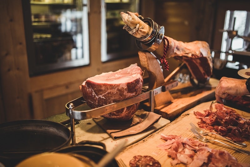 Cold meats on display at alpine dining