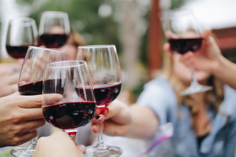 People toasting wines