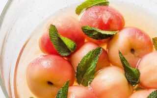 Vine peaches poached in green tea syrup with mint