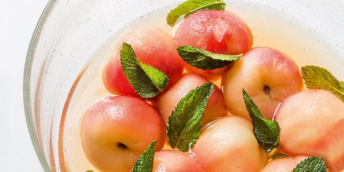 Vine peaches poached in green tea syrup with mint