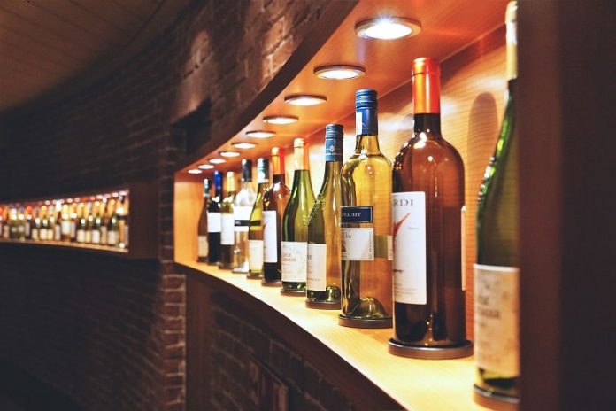 Wines on a lit shelf