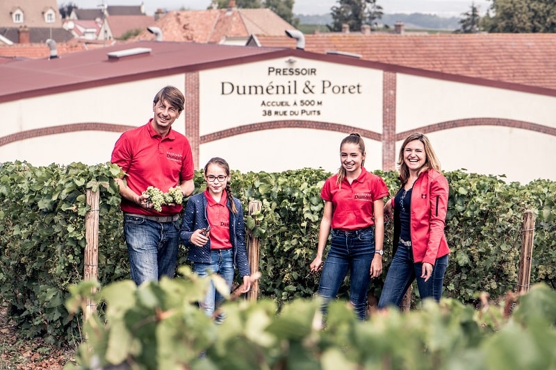 Dumenil Family in vineyard