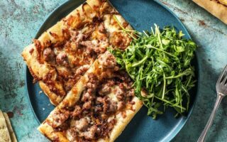Sausage & caramelised onion tart