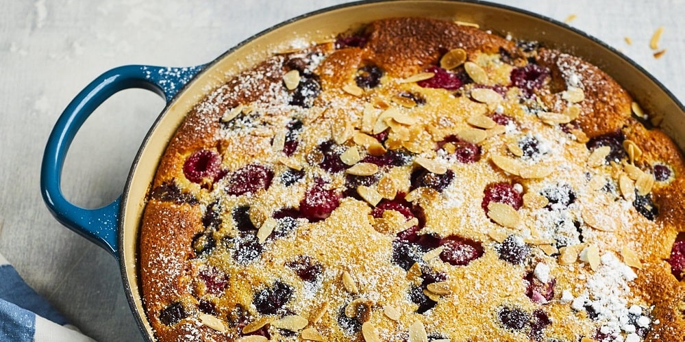 Le Creuset cherry, berry and almond clafoutis
