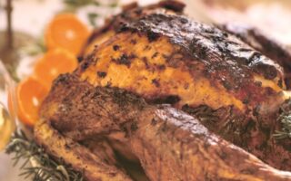 Roast turkey with clementines and garlic