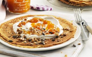 Vegan apricot crêpes with toasted nuts & seeds