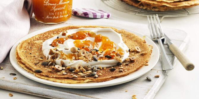 Vegan apricot crêpes with toasted nuts & seeds