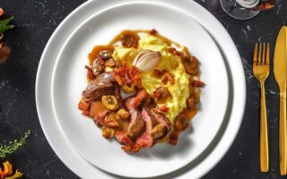 Venison bourguignon with roasted garlic mash