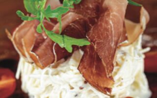Remoulade of celeriac with Savoie ham and basil oil