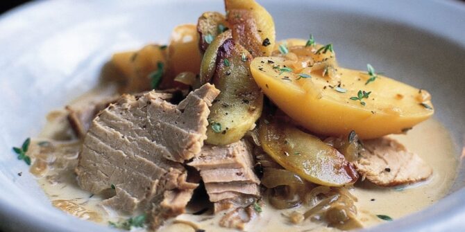 Pork in cider with potatoes and apples