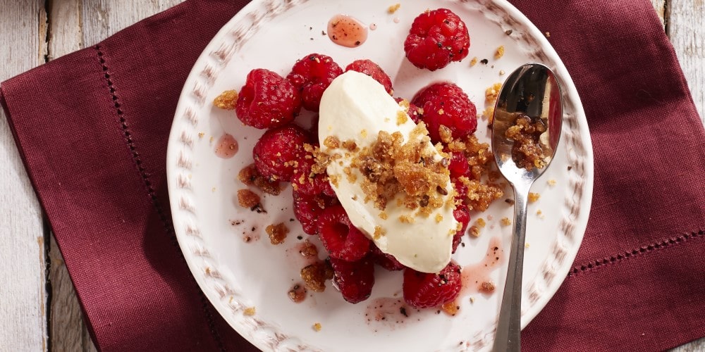 Caramel, black pepper crunch with lime cream and raspberries