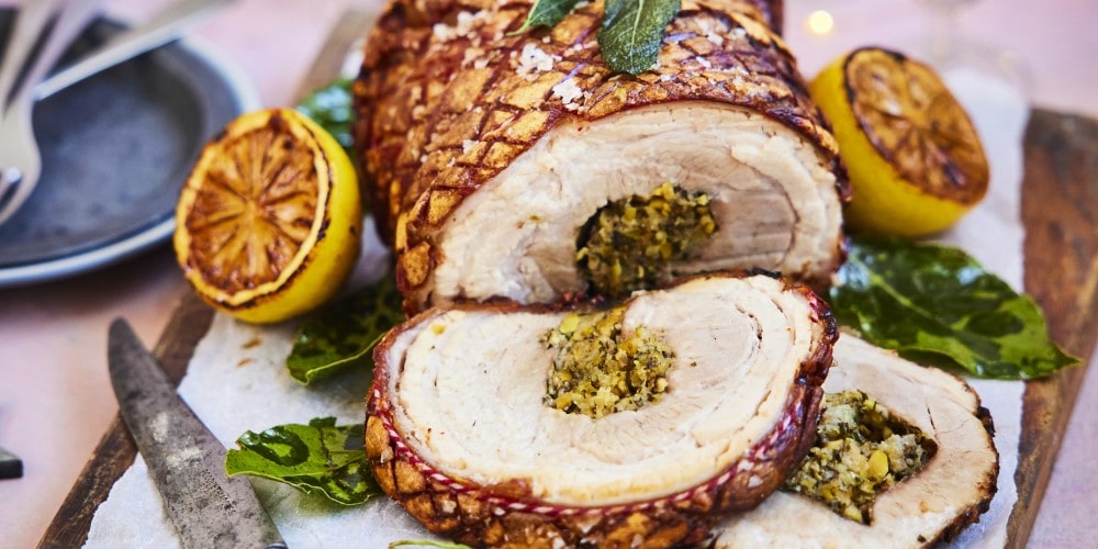 Rolled porchetta with pistachios, fennel and lemon