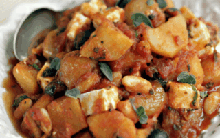 Cassoulet of potatoes with tomato, feta & parsley