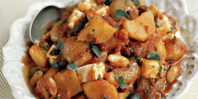 Cassoulet of potatoes with tomato, feta & parsley