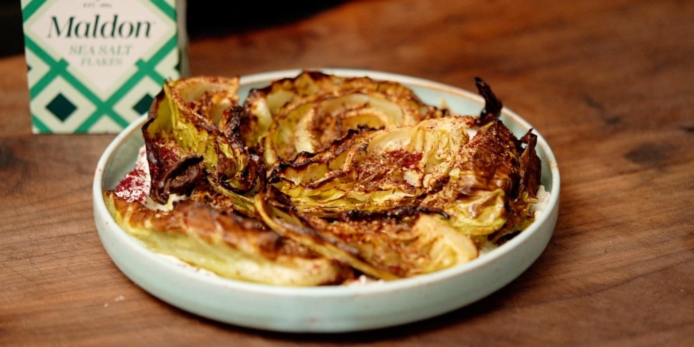 Charred cabbage with almond cream and spiced salt