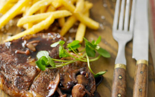 Rib-eye Steak with Mushroom and Wild Blueberry Sauce