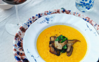 Red Kuri squash, carrot, and ginger soup with shiitake mushrooms