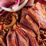 Duck and lentils on a plate
