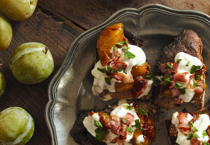 Greengage plum, bacon and burrata crostini