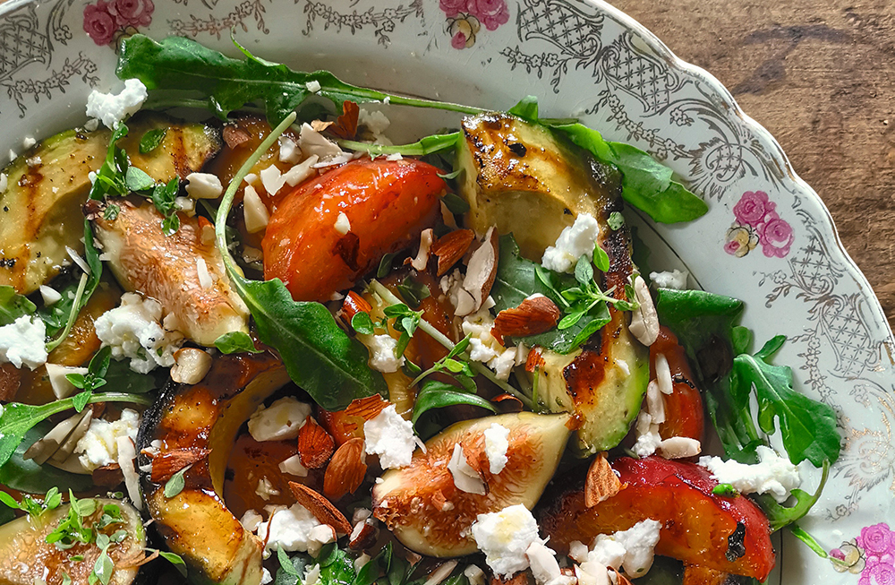 Grilled peach and avocado salad with goat cheese