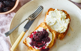 Stewed vanilla blackberries and French sea salt cream cheese on brioche toast