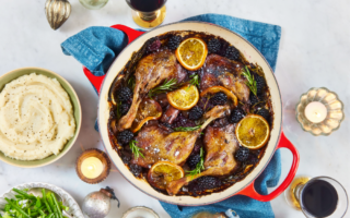 Slow cooked duck legs with blackberries, orange, and cinnamon