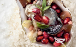 Poached oysters with pomegranate sauce vierge by Ferrandi School of Culinary Arts