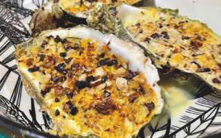 Oysters au gratin with cocoa nibs