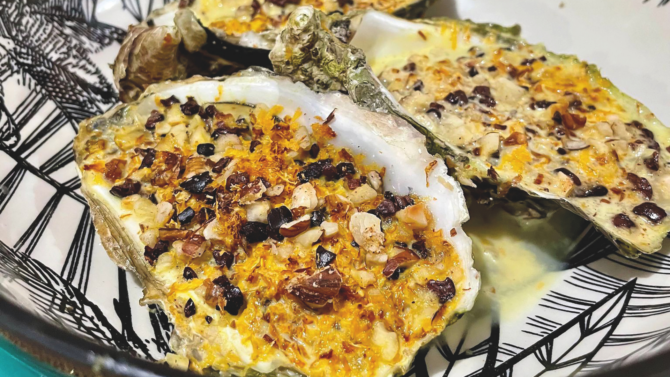 Oysters au gratin with cocoa nibs